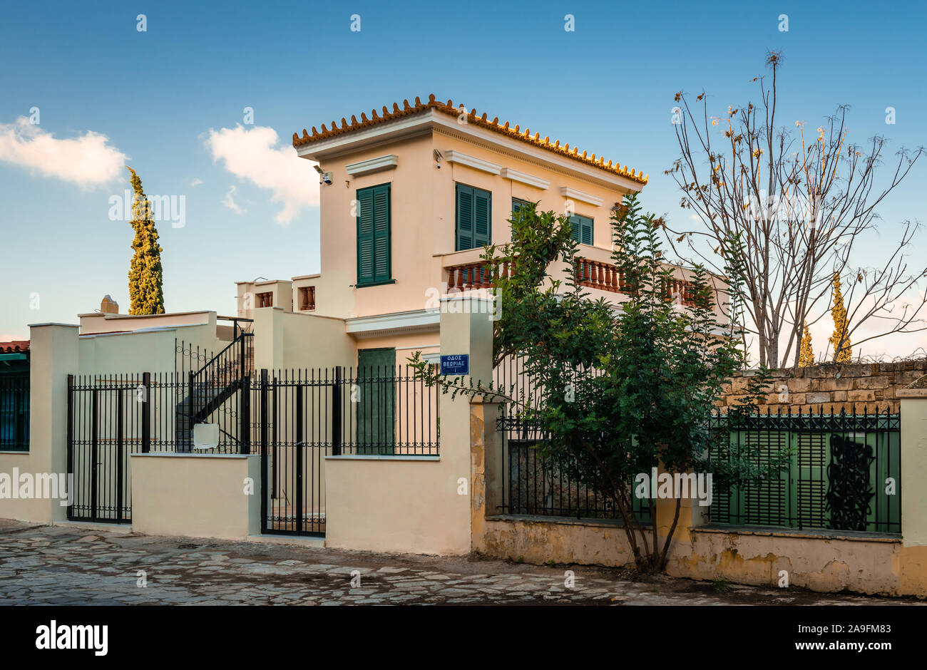 A neoclassical house at Theorias st, the street that leads to the top of the Acropolis hill, in Athens, Greece. Stock Photo