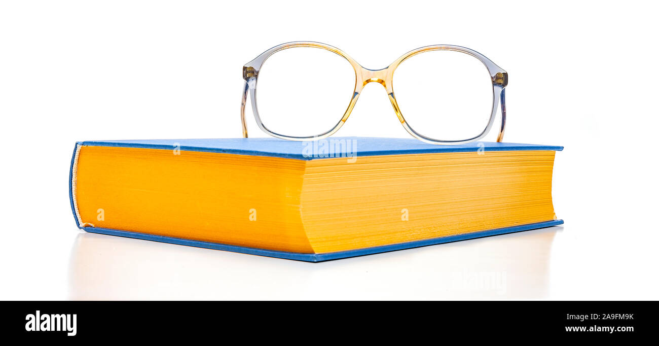 Reading glasses and book Stock Photo Alamy