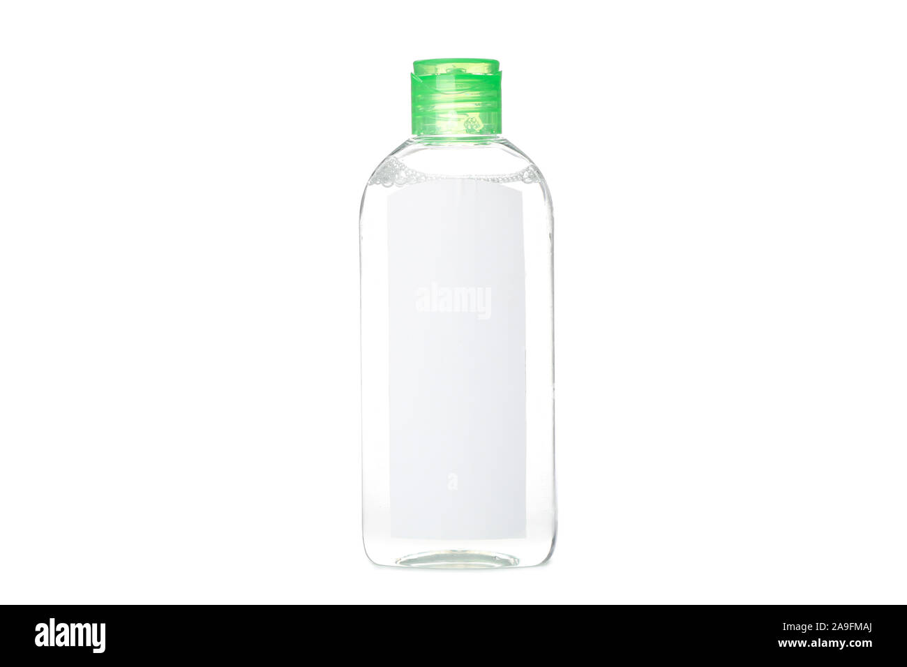 Liquid in bottle isolated on white background Stock Photo - Alamy