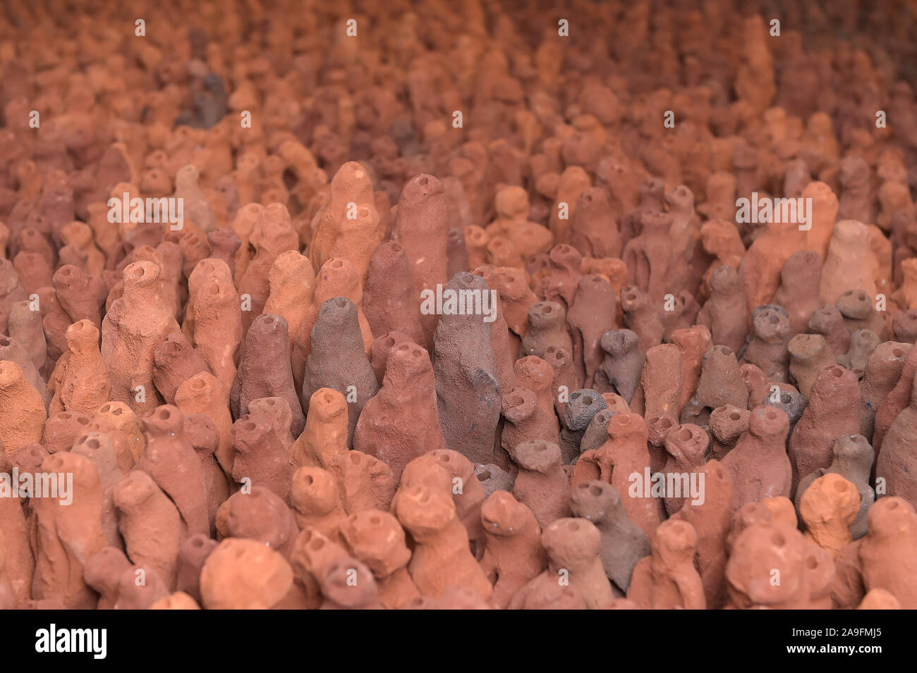 Colchester Essex UK 15th November 2019. The renowned Field for the British Isles, by Antony Gormley arrives at Firstsite Colchester in Essex. Field for The British Isles, which consists of 40,000 tiny individual terracotta figures, is the largest single artwork in the Arts Council Collection and its arrival in Colchester will herald the latest stage in the journey of this spectacular piece. Gormley, who won the Turner Prize in 1994 after this work was created, currently has a major solo exhibition at The Royal Academy. Credit: MARTIN DALTON/Alamy Live News Stock Photo