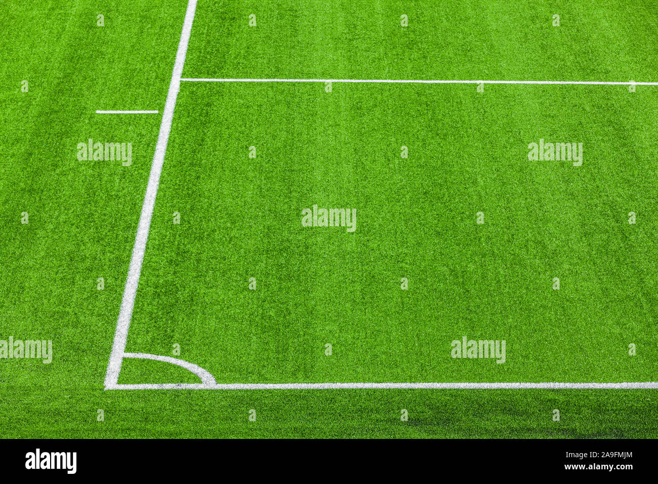 Football field made of artificial turf Stock Photo Alamy