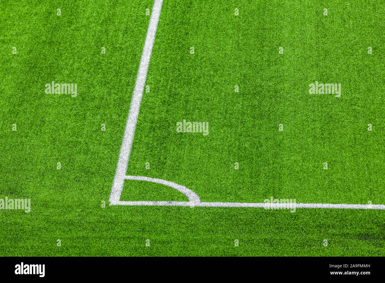 Football field made of artificial turf Stock Photo Alamy