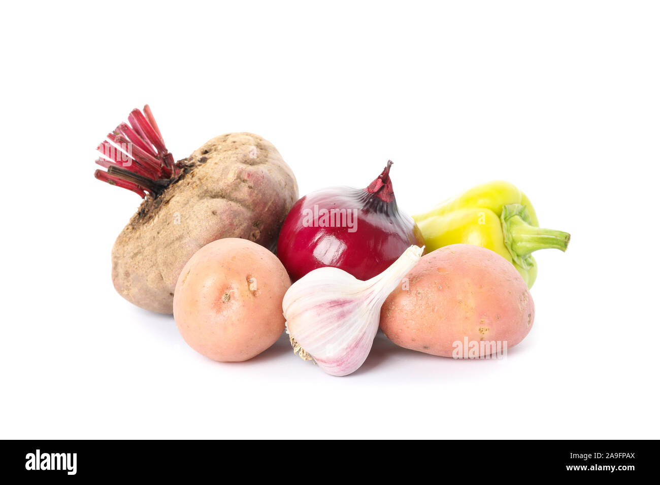 Pepper, potato, garlic, onion and beet isolated on white background