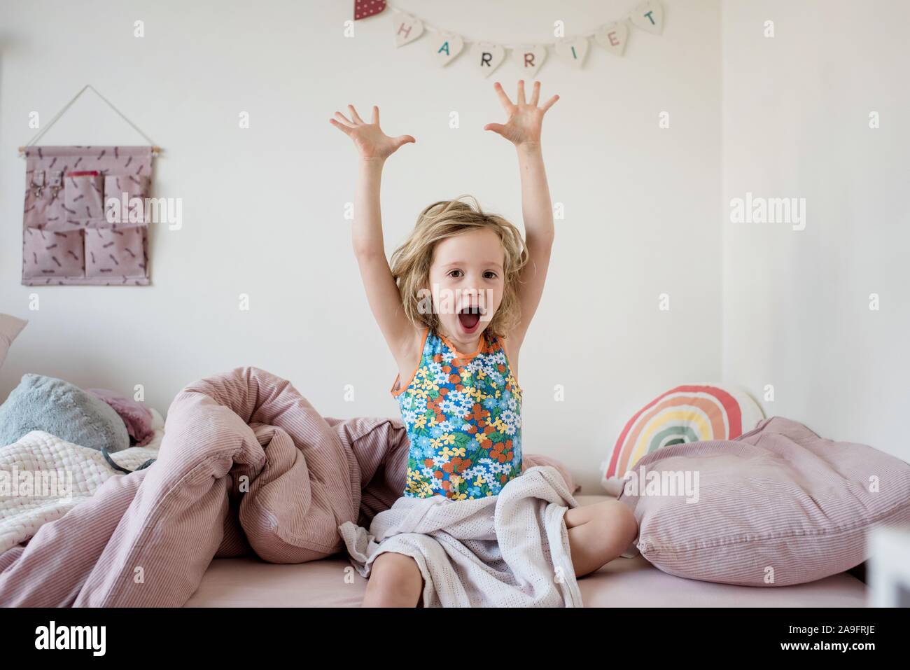 Young Girl Stretching And Yawning In The Morning In Her Bed At Home ...