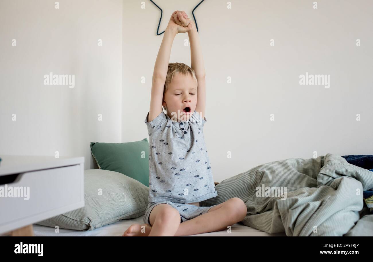 Child waking up alarm hires stock photography and images Alamy
