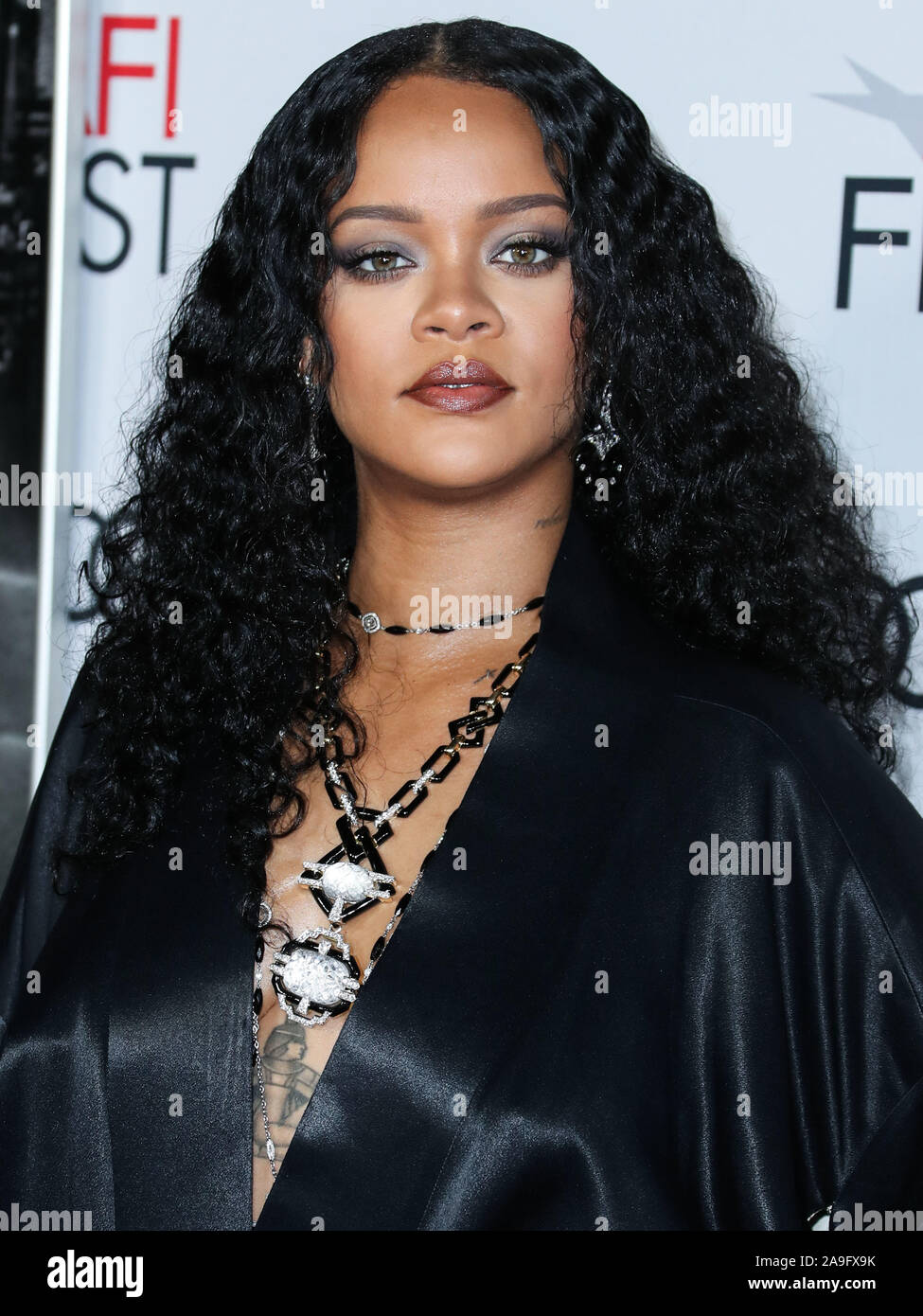 Hollywood, United States. 14th Nov, 2019. HOLLYWOOD, LOS ANGELES, CALIFORNIA, USA - NOVEMBER 14: Singer Rihanna wearing a John Galliano evening coat from William Vintage along with a necklace and bracelets by David Webb arrives at the AFI FEST 2019 - Opening Night Gala - Premiere Of Universal Pictures' 'Queen And Slim' held at the TCL Chinese Theatre IMAX on November 14, 2019 in Hollywood, Los Angeles, California, United States. (Photo by Xavier Collin/Image Press Agency) Credit: Image Press Agency/Alamy Live News Stock Photo