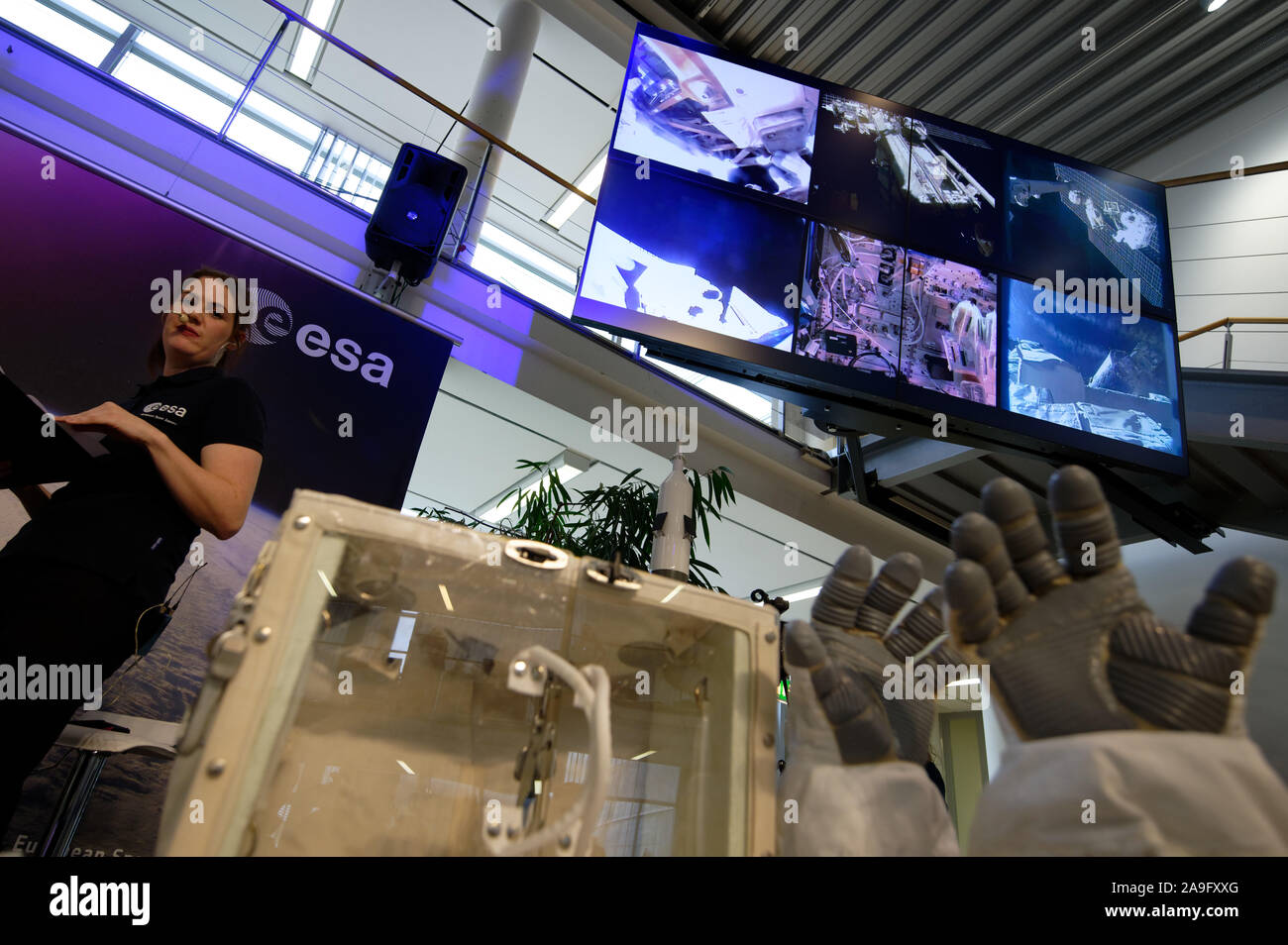 Cologne, Germany. 15th Nov, 2019. ESA astronaut Luca Parmitano and NASA astronaut Andrew Morgan are on display at an event at the European Astronaut Centre (EAC) during their field mission on the ISS space station. The astronauts are to repair the alpha magnetic spectrometer (AMS-02) at the ISS. Credit: Henning Kaiser/dpa/Alamy Live News Stock Photo