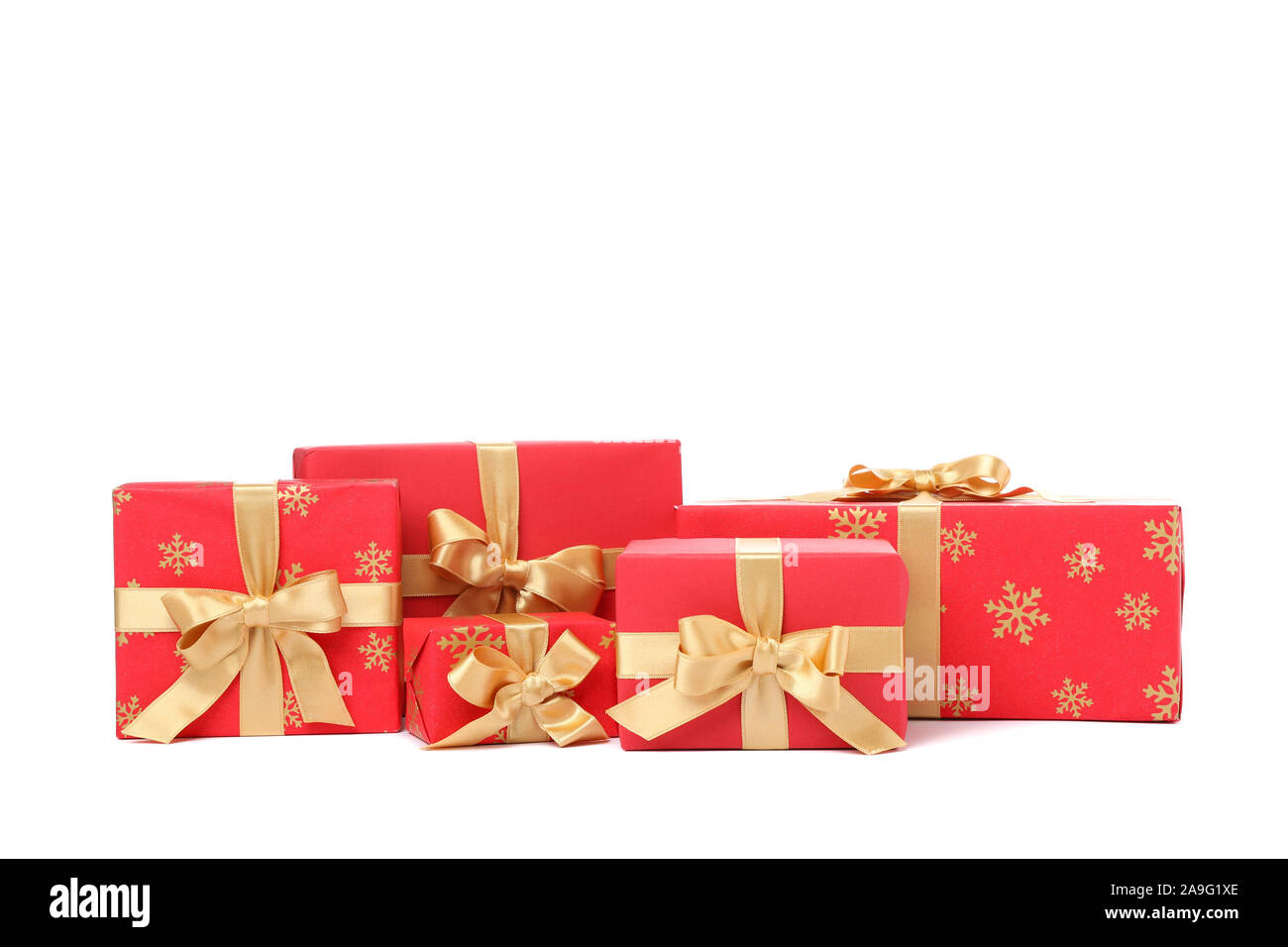 Gift boxes with golden bow isolated on white background Stock Photo - Alamy
