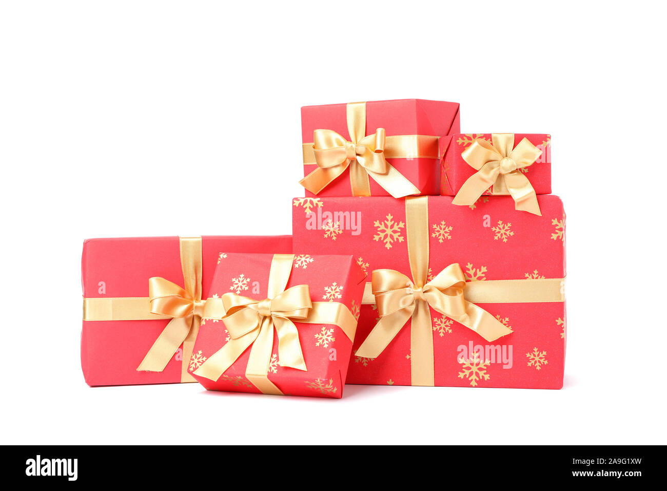 Gift boxes with golden bow isolated on white background Stock Photo - Alamy