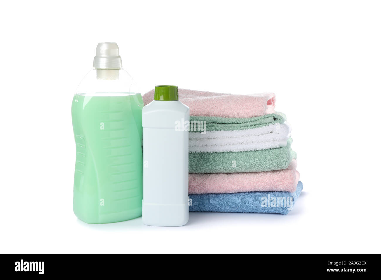 Laundry detergent and folded towels isolated on white background Stock Photo