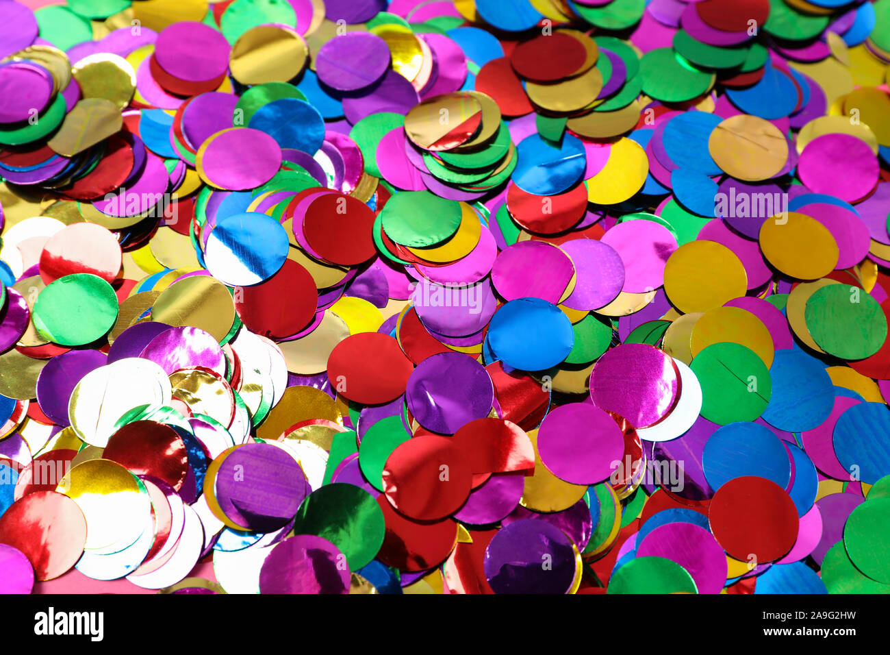 Multicolored glitter texture on whole background, close up Stock Photo