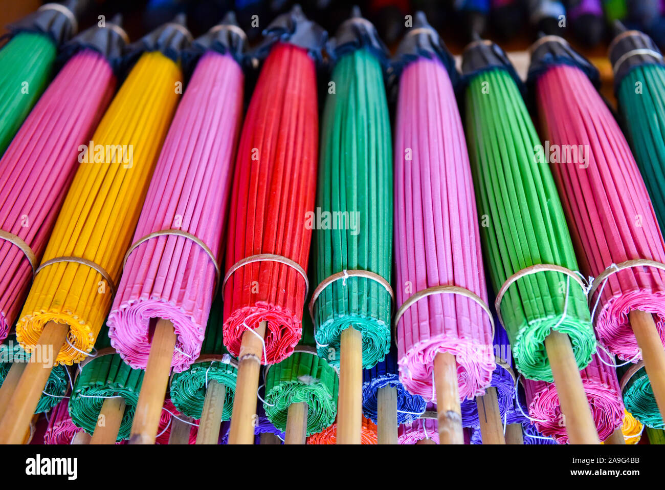 Multicoloured paper umbrellas , Northern Thailand Stock Photo