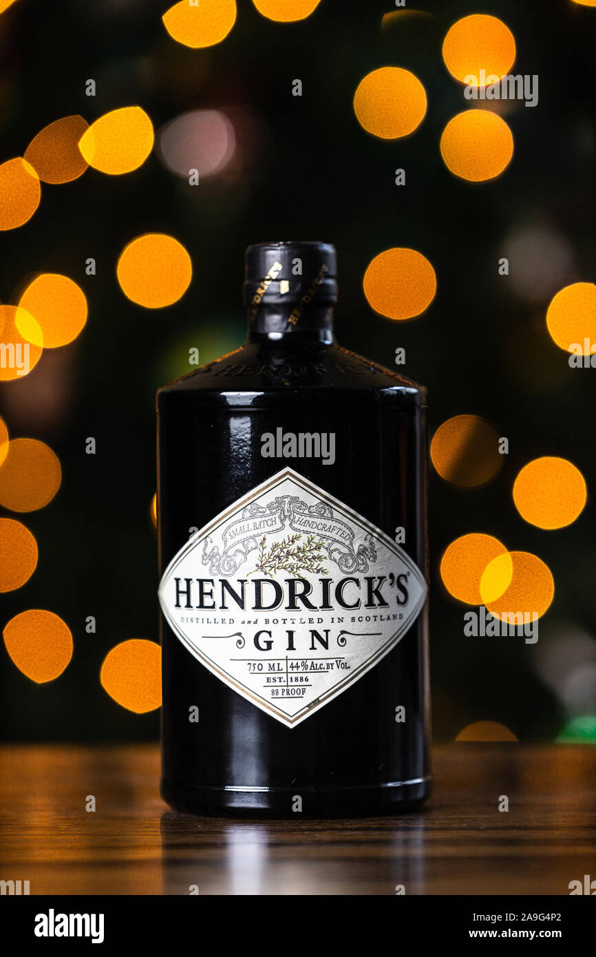Hendrick's Gin bottle in front of Christmas lights. Hendrick's Gin has