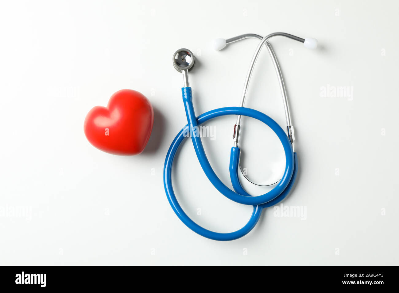 Stethoscope and heart on white background, space for text Stock Photo ...
