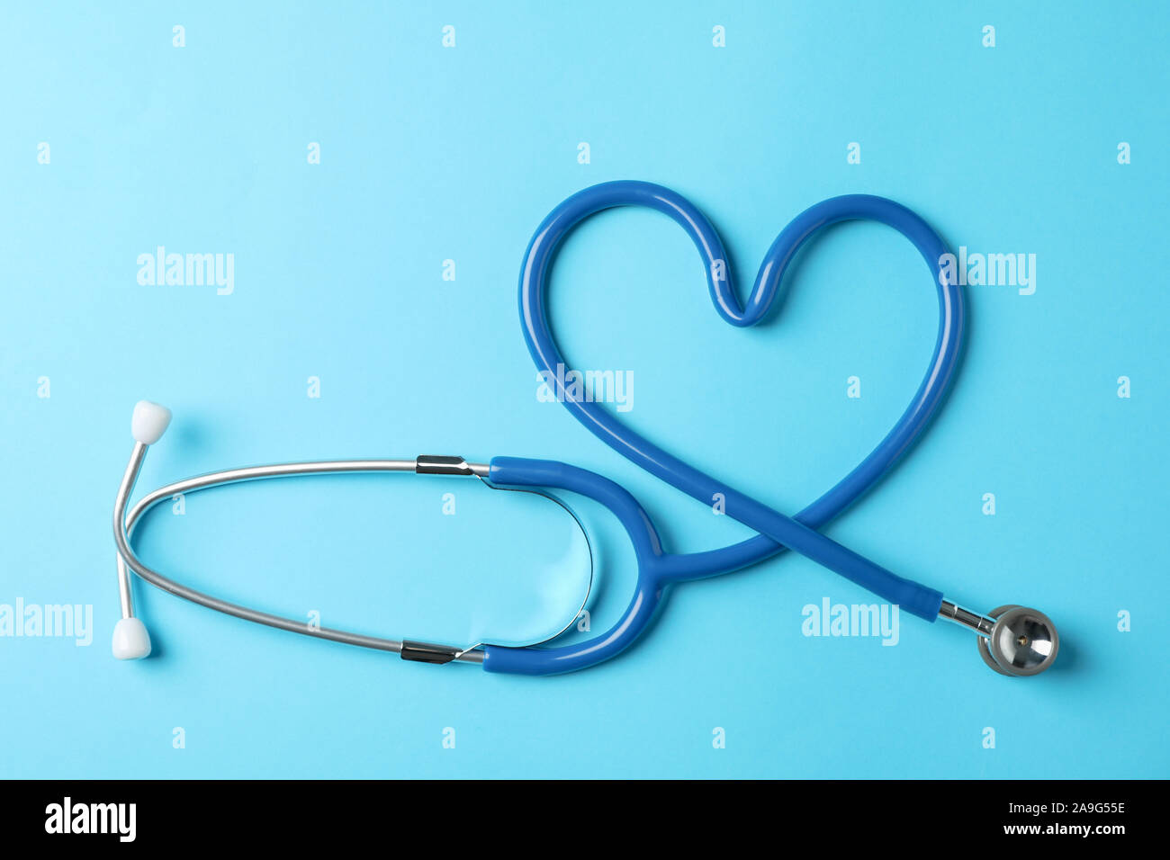 Stethoscope on blue background, space for text Stock Photo Alamy