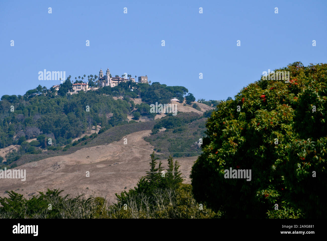 The castle-like Hearst Castle estate on a hilltop on Highway 1, California, USA Stock Photo
