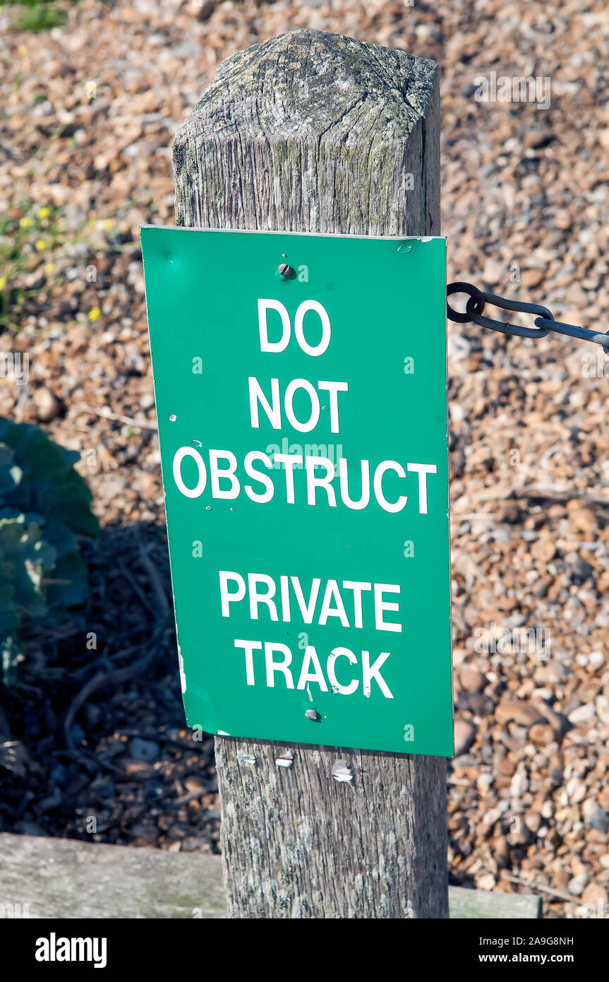 Do not obstruct, private track sign. Stock Photo