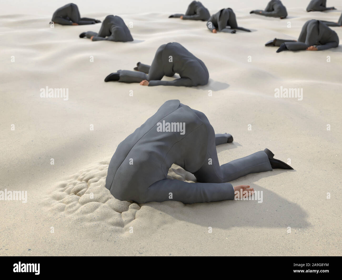 group of businessmen hides their heads in the sand Stock Photo Alamy