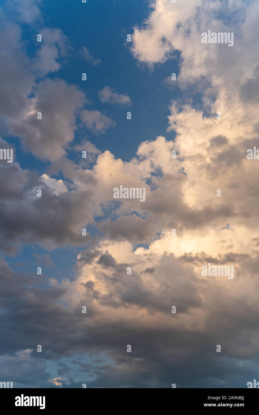 White epic clouds against blue sky Stock Photo