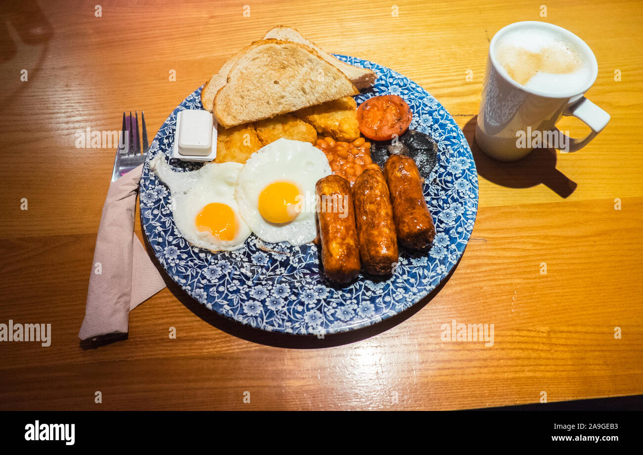 Vegetarian,breakfast,with, 2,eggs,and,3, Quorn,sausages,at,in,Wetherspoons,pub,bar,Carmarthen,town,centre,Carmarthenshire,Wales,Welsh,GB,Britain,UK, Stock Photo