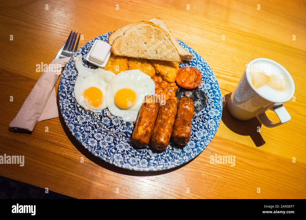 Vegetarian,breakfast,with, 2,eggs,and,3, Quorn,sausages,at,in,Wetherspoons,pub,bar,Carmarthen,town,centre,Carmarthenshire,Wales,Welsh,GB,Britain,UK, Stock Photo
