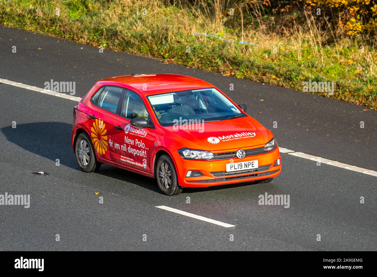 2019 red VW Volkswagen Polo S EVO; UK Vehicular traffic, transport, modern  vehicles, saloon cars, south-bound on the 3 lane M61 motorway highway Stock  Photo - Alamy