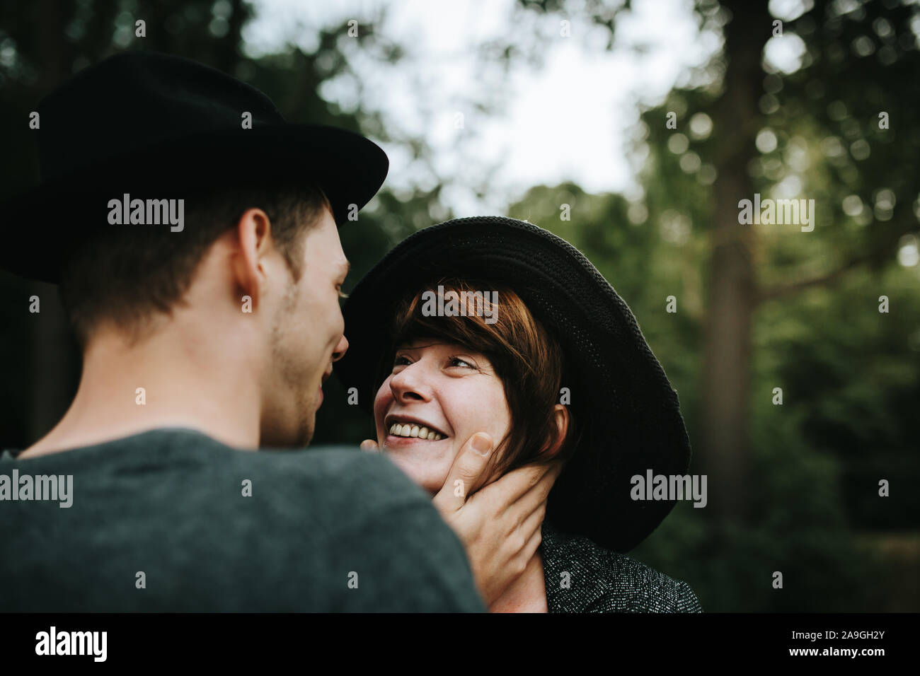 young heterosexual couple looking at each other Stock Photo