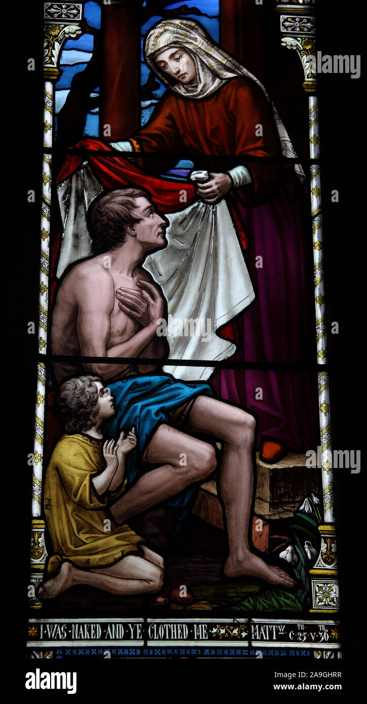 Glasgow Cathedral stained glass window, I was naked and ye clothed me, Castle St, Glasgow, Scotland, G4 0QZ Stock Photo