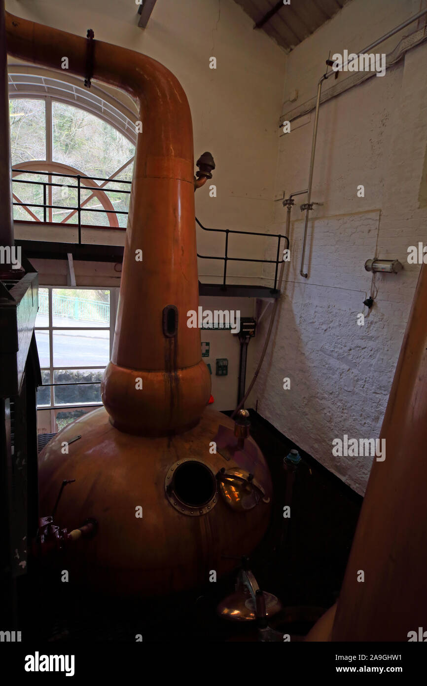 Copper Still and tubes, Tobermory Whisky Distillery,Isle of Mull, West of Scotland, UK, PA75 6AB Stock Photo