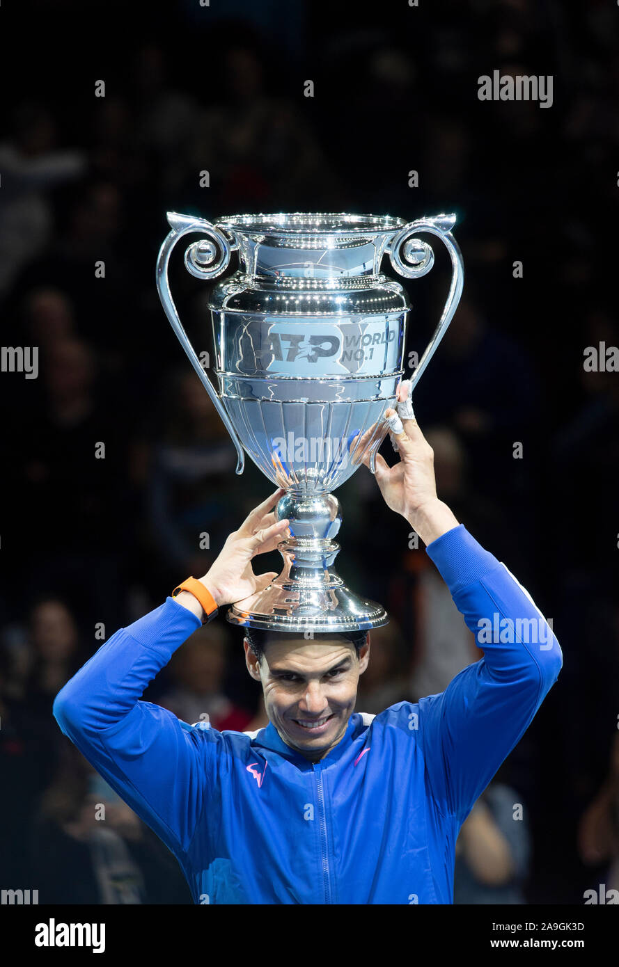 O2, London, UK. 15th November 2019. Rafael Nadal lifts the trophy onto