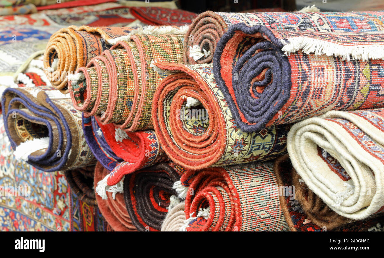 many rugs and carpets at stand of the market Stock Photo - Alamy