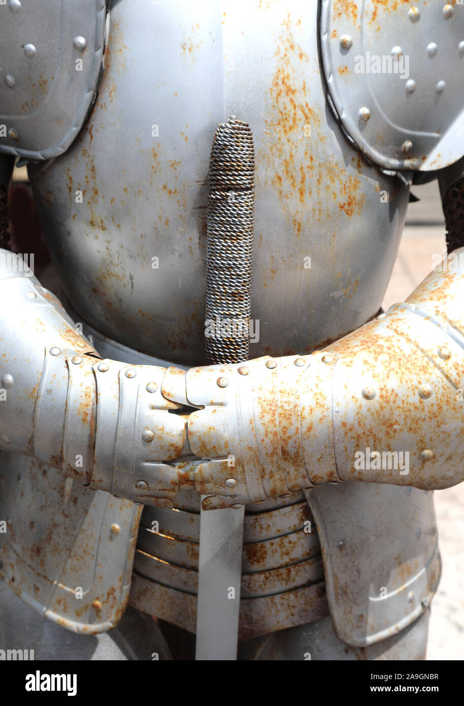 rusty armor of a medieval knight used for a historical re-enactment Stock Photo