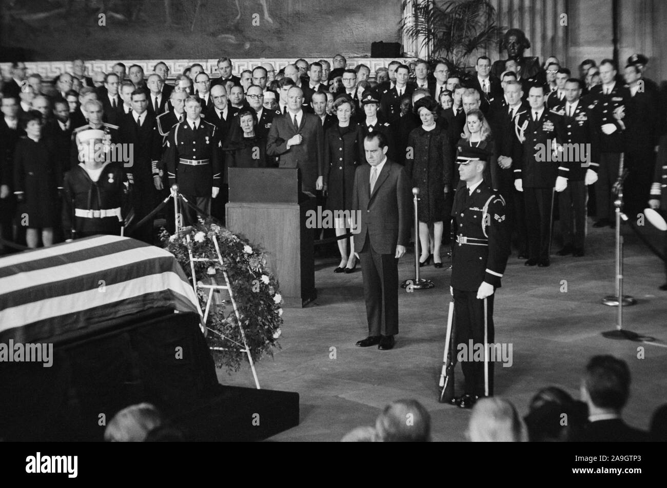 U.S. President Richard M. Nixon Standing before Flag-Draped Casket of Former U.S. President Dwight D. Eisenhower, Washington, D.C., USA, photograph  by Thomas J. O'Halloran, March 30, 1969 Stock Photo