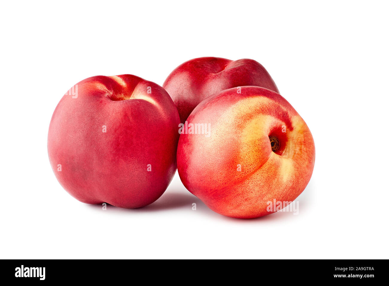 Three ripe nectarines on white background Stock Photo Alamy