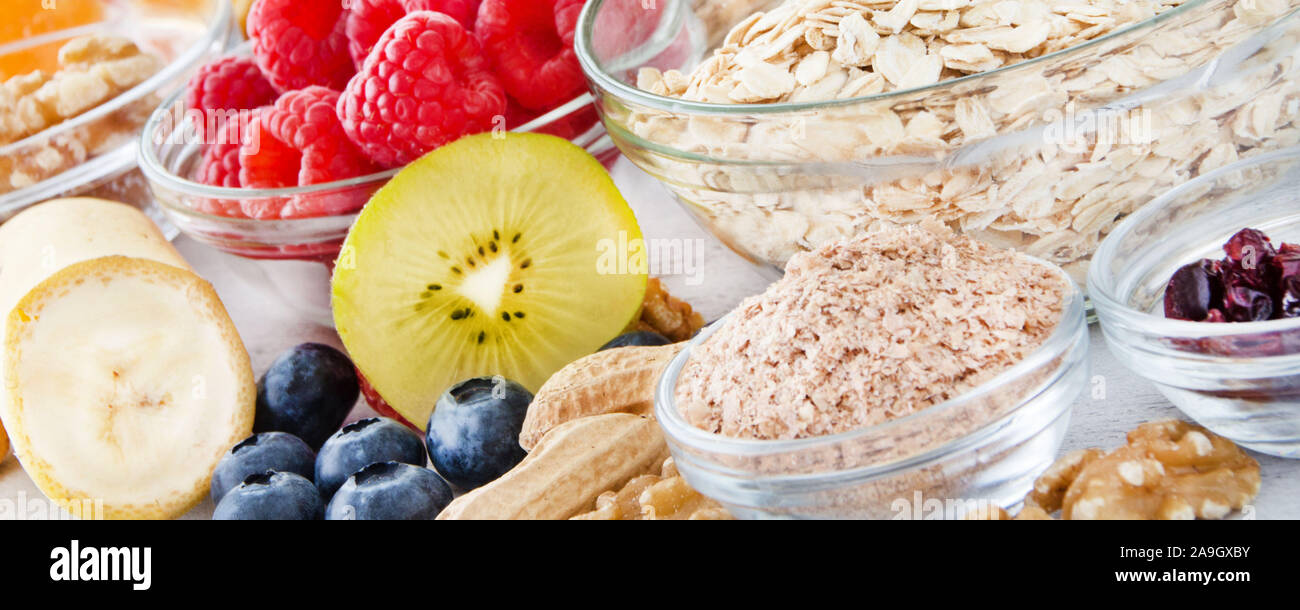 Breakfast oats and fruits with nuts Stock Photo Alamy