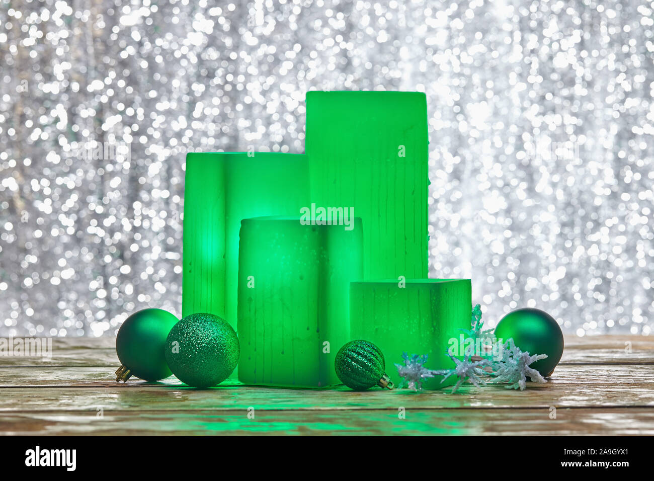 Winter holiday Christmas still life of glowing green electric square