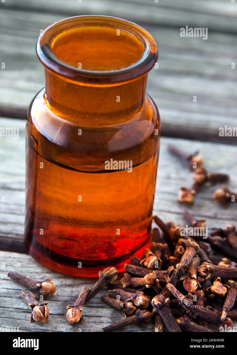 Essential oil with cloves Stock Photo Alamy