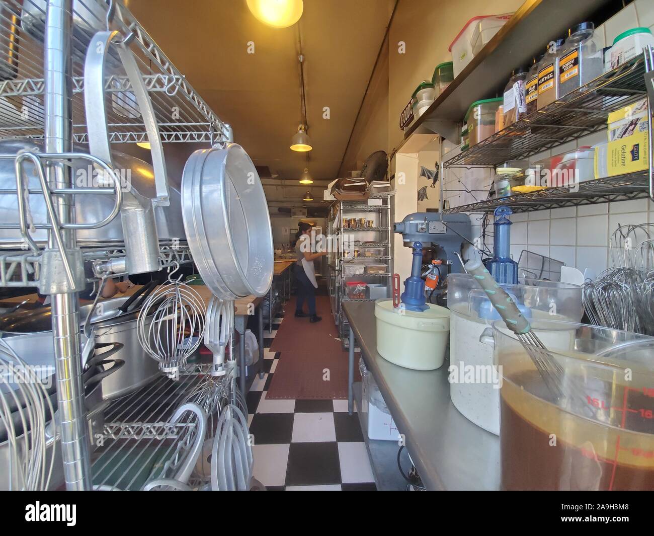 Wide angle of kitchen area at Tartine Bakery in the Mission District neighborhood of San Francisco, California, widely considered among the best bakeries in the world, October 6, 2019. () Stock Photo