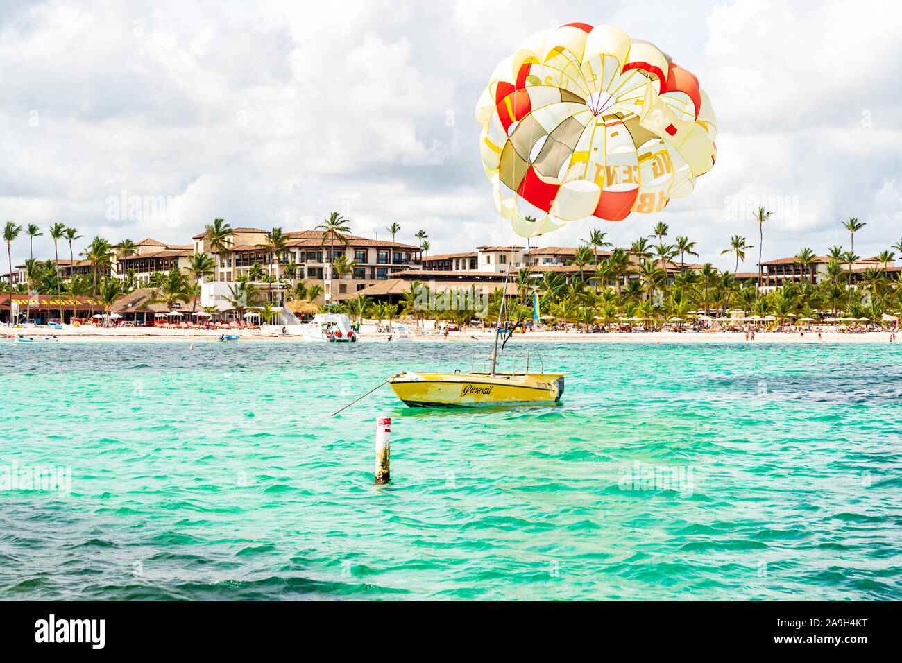 Punta Cana, Dominican Republic - October 25, 2019: Relaxing Turquoise Waters of Dominican Republic with Water Sports and a Beautiful Beach. Stock Photo