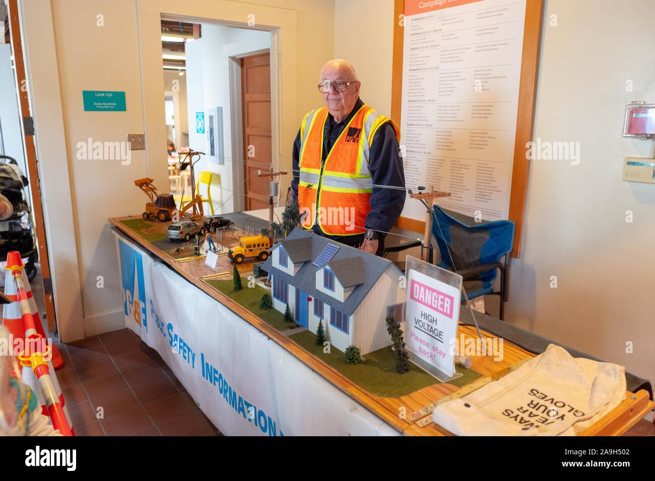 An employee of Pacific Gas and Electric Company (PGE) uses a diorama to demonstrate risks associated with electrical power lines during a public safety demonstration following the Public Safety Power Shutoff affecting the San Francisco Bay Area, Sausalito, California, October 19, 2019. () Stock Photo