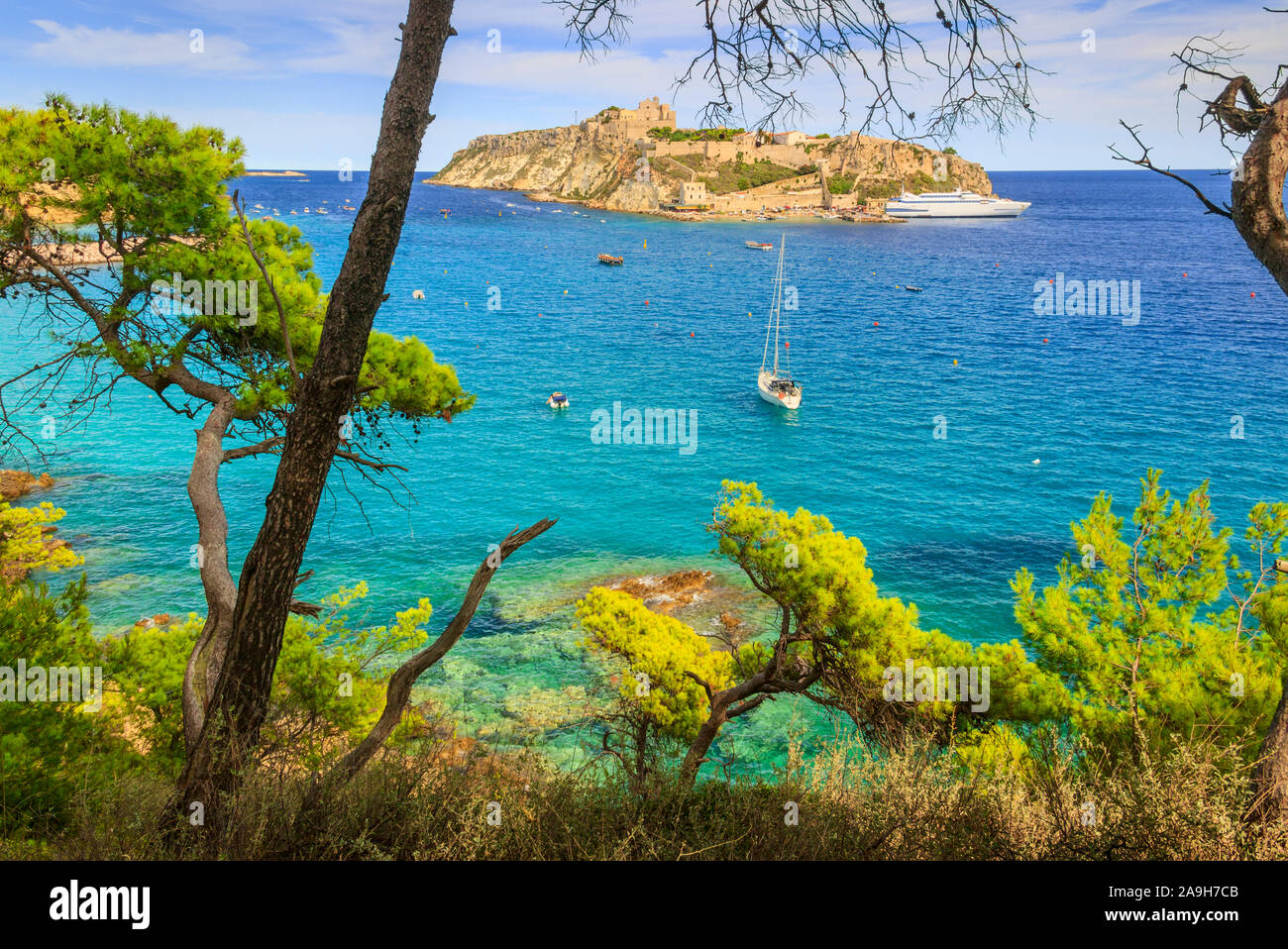 The archipelago of the Tremiti Islands: San Nicola island in background. It's dominated by the fortified towers of San Nicola and the Abbey. Stock Photo
