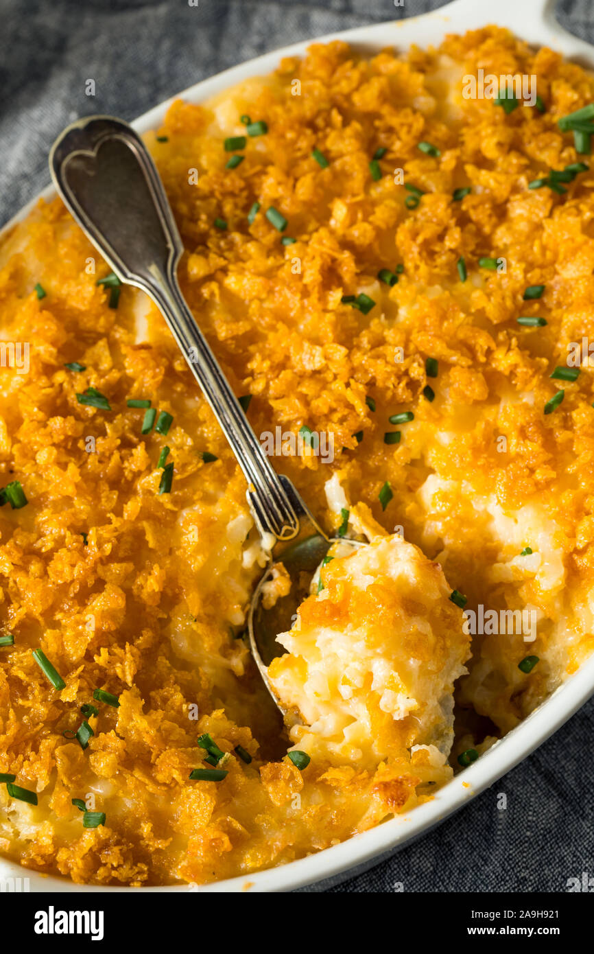 Homemade Funeral Potatoes Casserole with Cheese and Chives Stock Photo