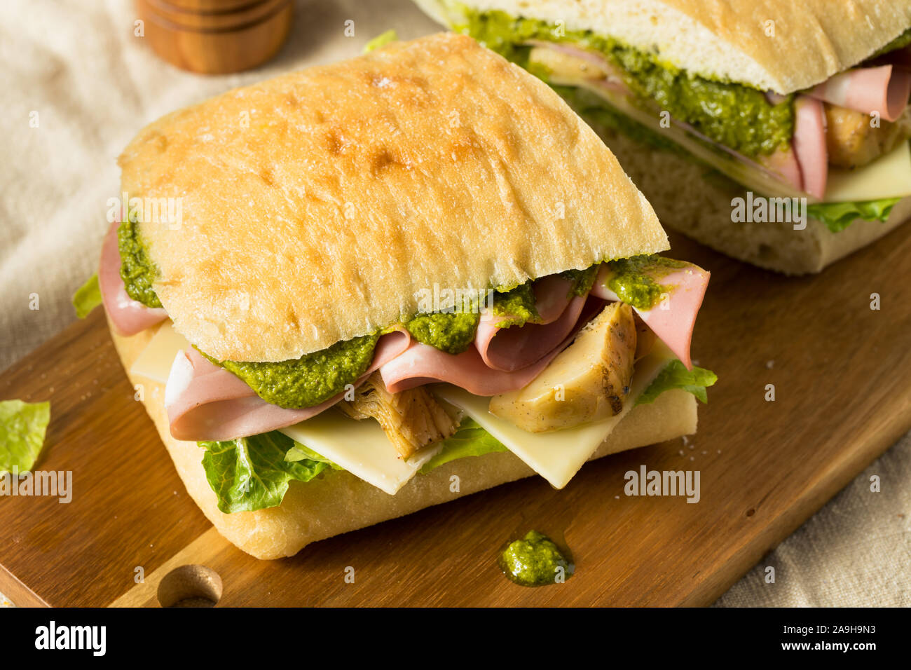 Homemade Italian Panino Sandwich with Artichoke and Mortadella Stock