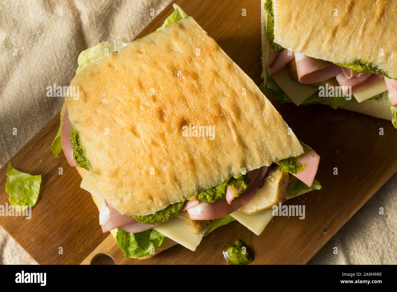 Homemade Italian Panino Sandwich with Artichoke and Mortadella Stock Photo