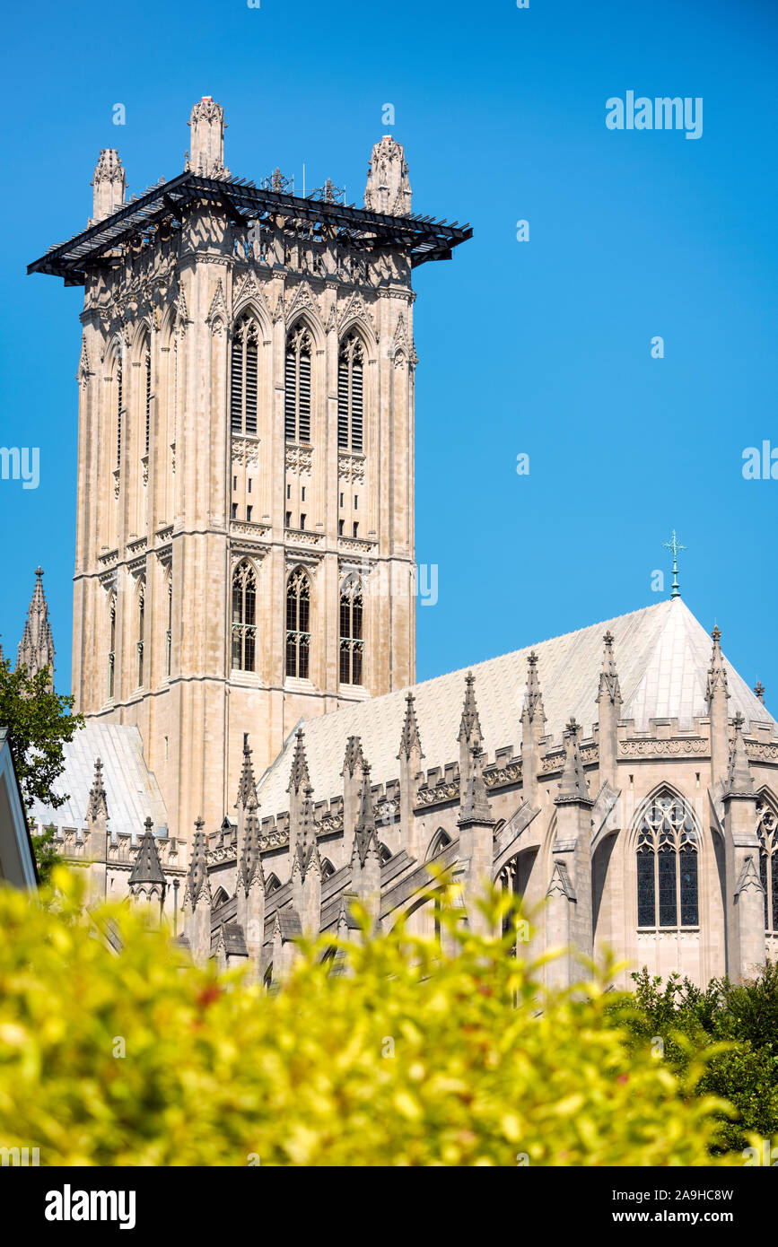 WASHINGTON, DC - Washington National Cathedral is an Episcopal church located in Washington DC and is the site of many of Washington DC's prominent church and remembrance services. Designed in the Neo-Gothic style, its construction was begun in 1906, with work continuing over following decades. It is the second-largest church building in the United States and stands as the fourth-tallest structure in Washington DC, a feature emphasized by sitting on a high point overlooking over the city. It is best known as Washington National Cathedral, but its formal name is Cathedral Church of Saint Peter  Stock Photo