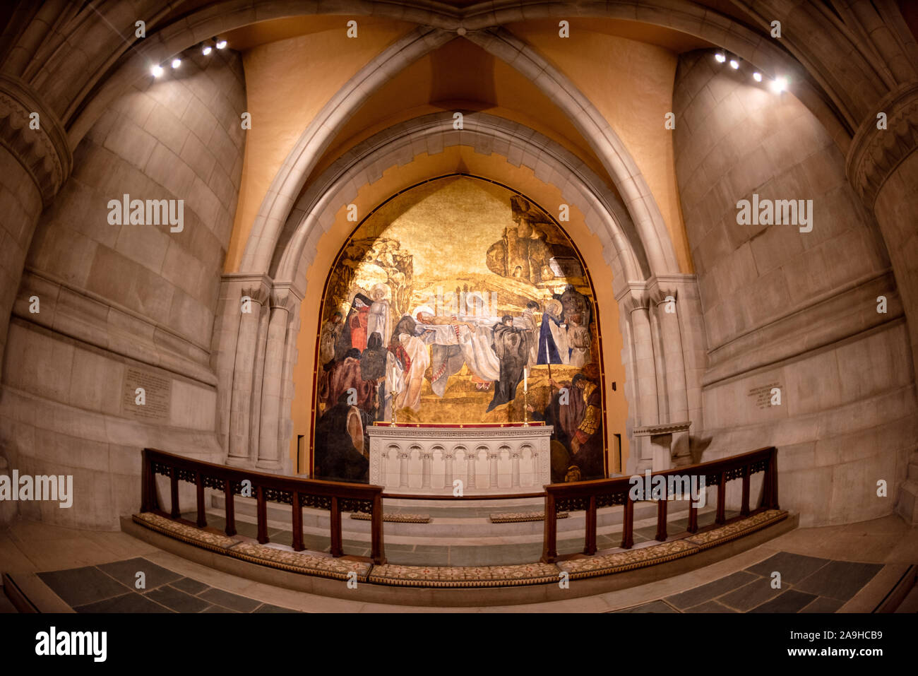 WASHINGTON, DC - The altar in the Chapel of St. Joseph of Arimathea in the crypt of Washington National Cathedral. Washington National Cathedral is an Episcopal church located in Washington DC and is the site of many of Washington DC's prominent church and remembrance services. Designed in the Neo-Gothic style, its construction was begun in 1906, with work continuing over following decades. It is the second-largest church building in the United States and stands as the fourth-tallest structure in Washington DC, a feature emphasized by sitting on a high point overlooking over the city. It is be Stock Photo