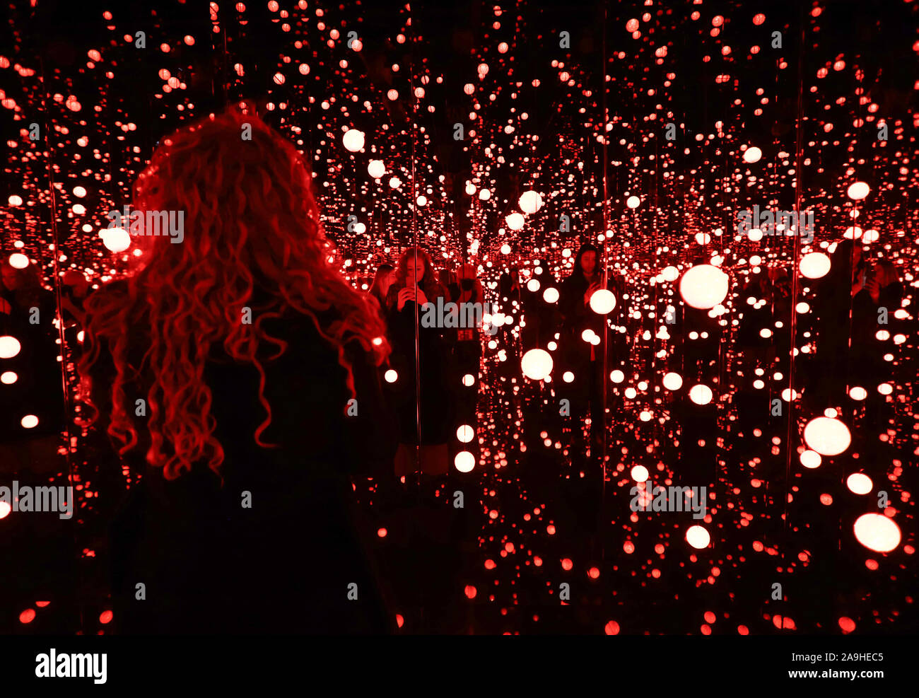 New York, United States. 15th Nov, 2019. People stand in and take photos of the Infinity Mirrored Room as part of the exhibition of entirely new work by Yayoi Kusama titled 'Every Day I Pray For Love' that includes paintings, sculptures, and a new Infinity Mirror Room on view at David Zwirner gallery on 537 West 20th Street in New York City on Friday, November 15, 2019. Photo by John Angelillo/UPI Credit: UPI/Alamy Live News Stock Photo