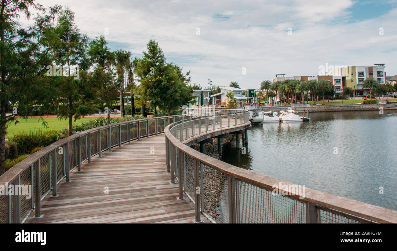 Lakeside promenade and boardwalk at  Center Lake Park, a public park with a boardwalk  in the city of Oviedo, Florida. Stock Photo