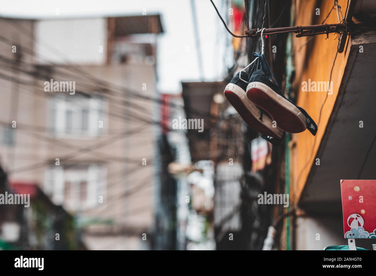 Sneakers hanging telephone wire hires stock photography and images Alamy