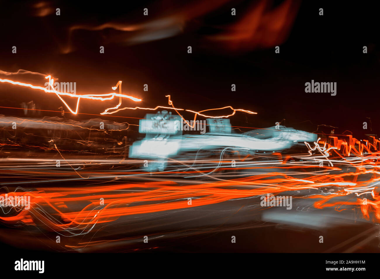Abstract speed motion in highway road car light trails colorful night lights perspective Stock Photo